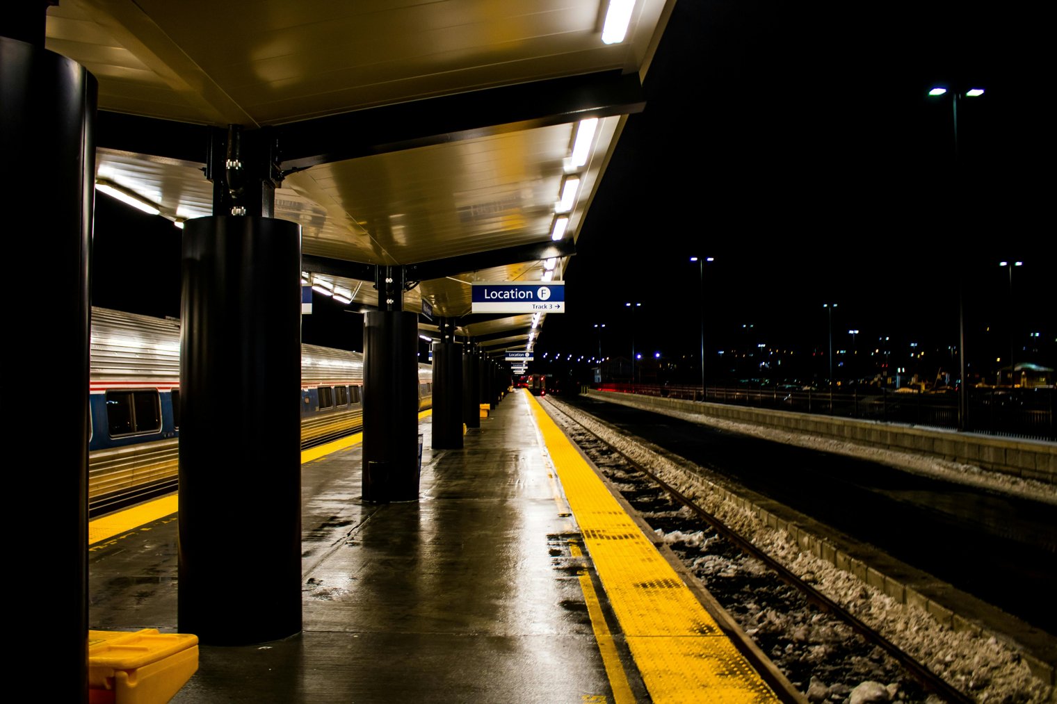 Watching the Last Train Depart from the Station at Midnight
