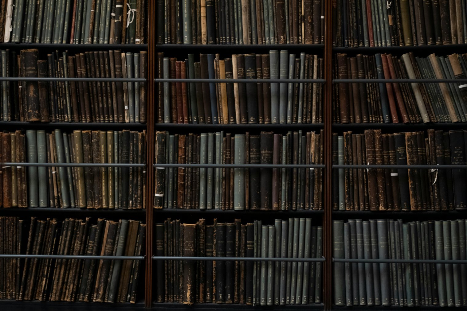Walking Through an Old Library, Browsing Forgotten Books on Dusty Shelves