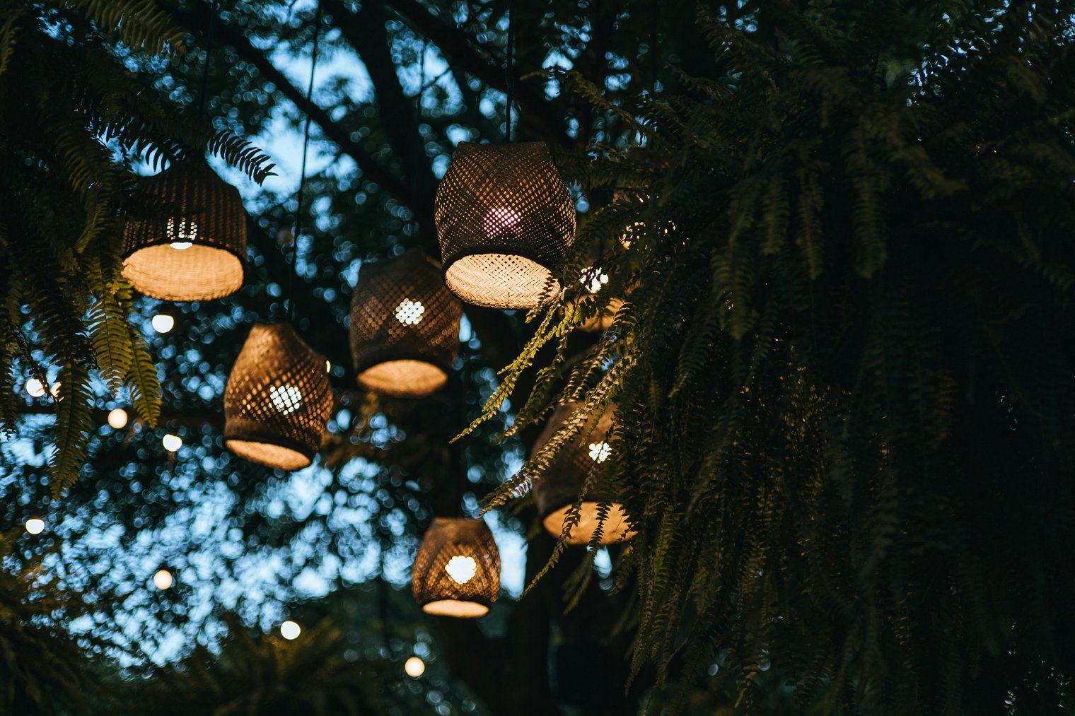 Strolling Through a Garden at Dusk, The Soft Glow of Lanterns Illuminating the Path