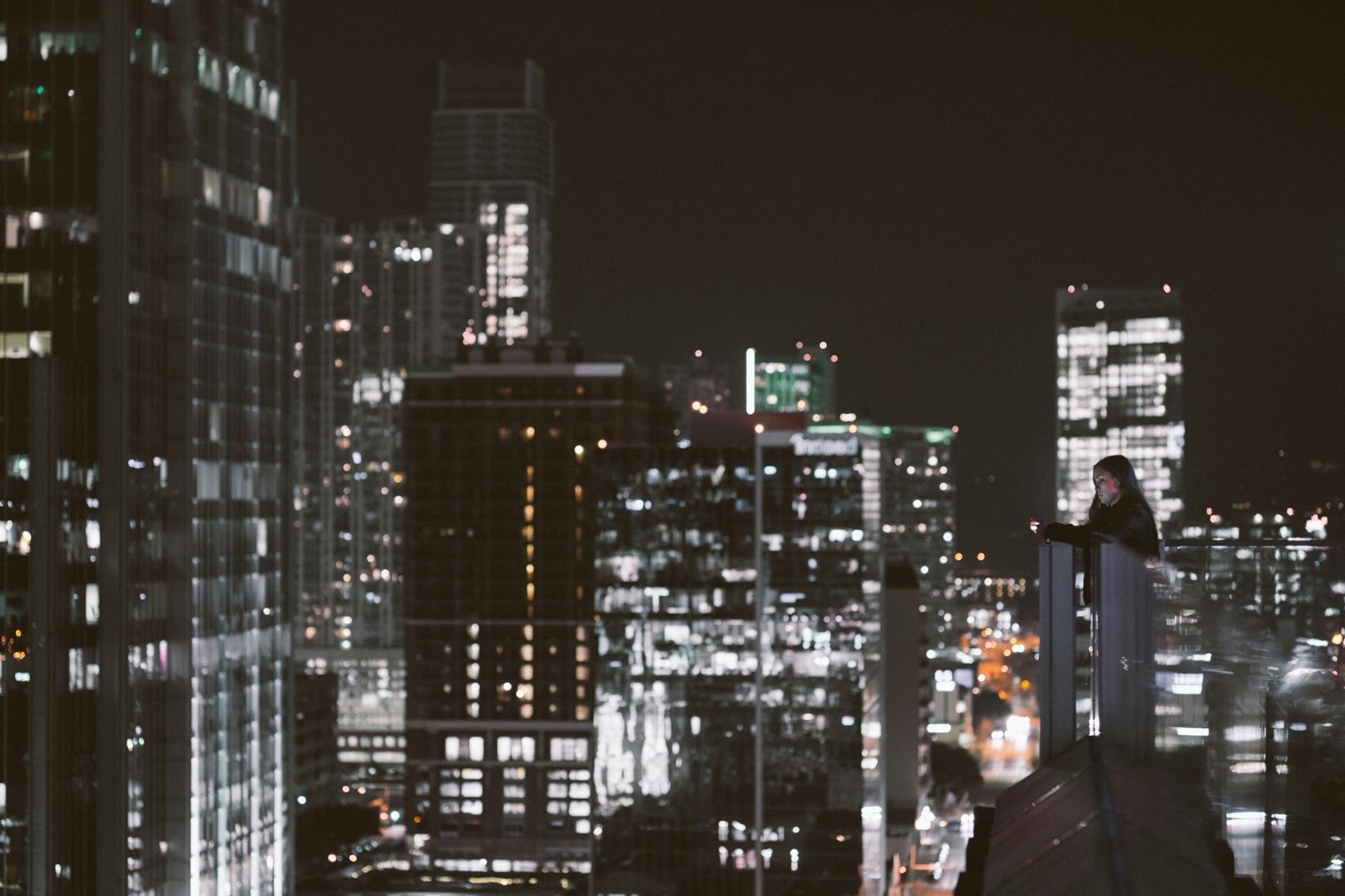 Sitting on the Roof of Your Apartment Building, Watching the City Below