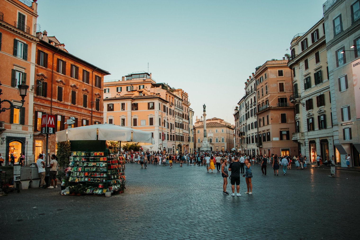 Watching a Street Performer Play the Violin in the Middle of a Busy Square