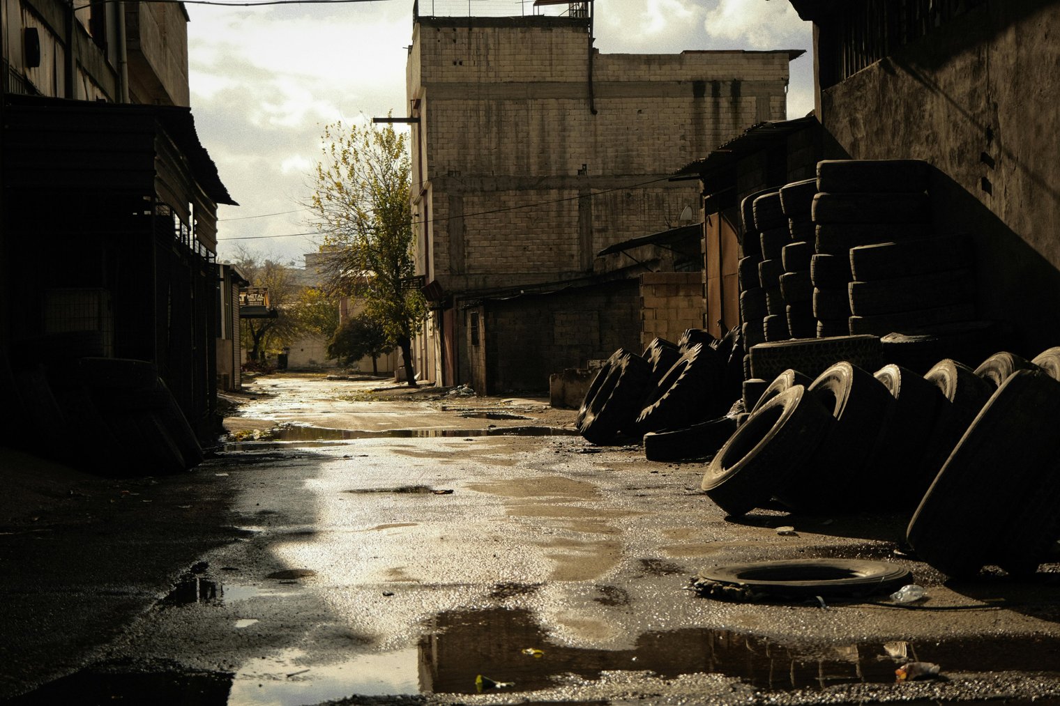 Walking Down an Abandoned Alley at Midnight, Watching the Moonlight Reflect off the Puddles