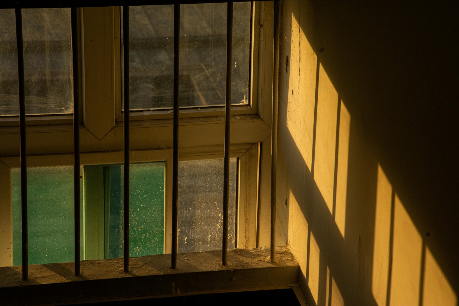 Watching the Sun Set Through a Half-Opened Window