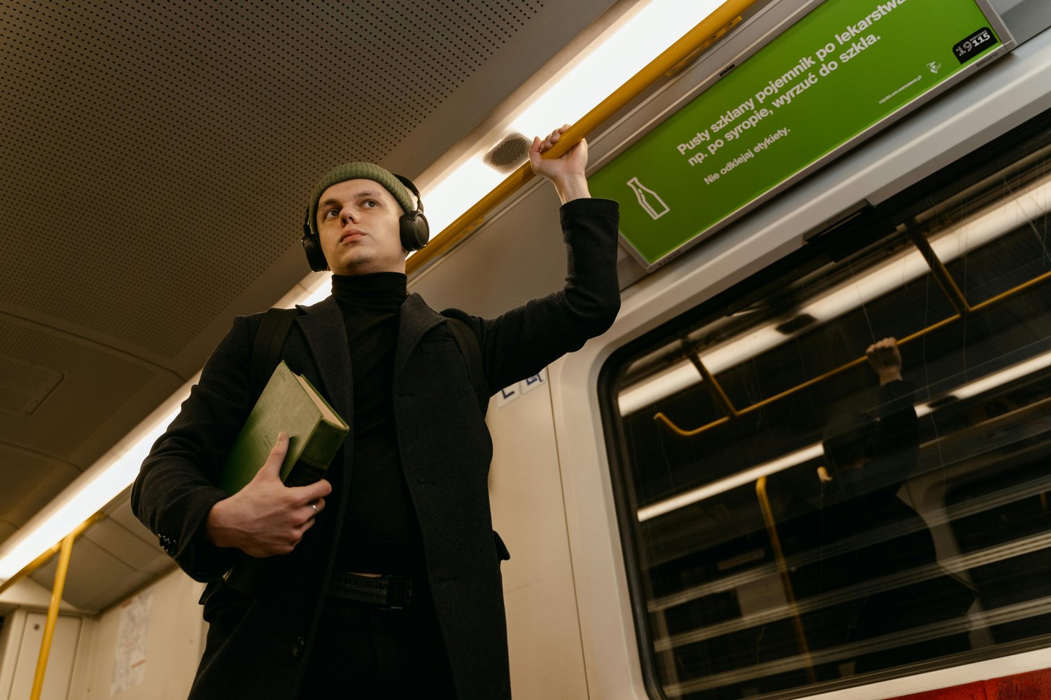 Sitting by a Window in a Crowded Train, Watching the City Rush By