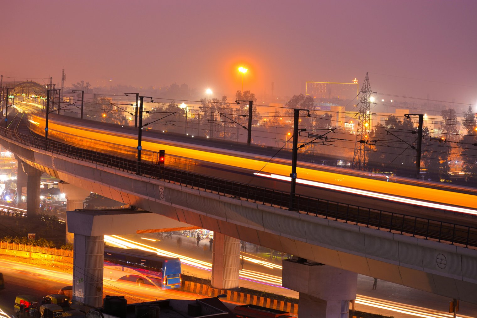 Sitting on a Train, Watching the City Lights Flicker by at Night